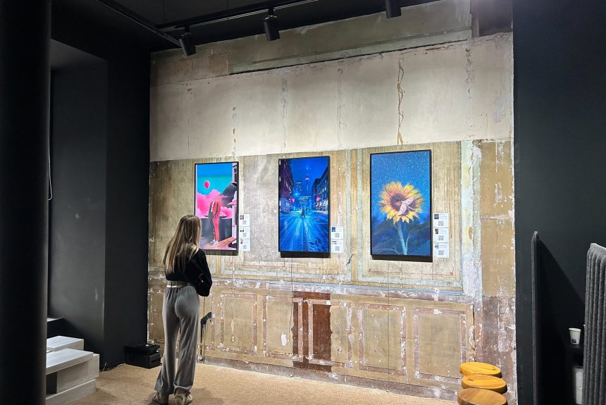 Woman looking at art on the wall